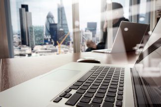 Laptop on a desk in London