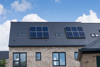 Housing with solar panels