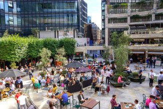 People drinking at Broadway Circle, Liverpool Street Station
