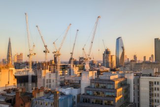 Photo of cranes close to the City of London
