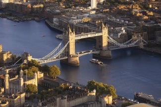 Boat travelling under tower bridge 