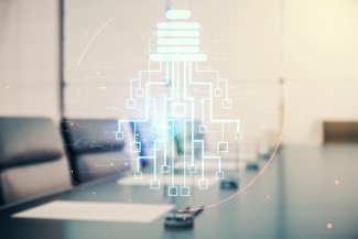 Boardroom image Virtual creative light bulb with chip hologram on a modern boardroom background, artificial Intelligence and neural networks concept.