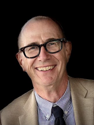 Headshot of Alistair Godbold of the Nichols Group